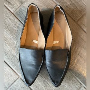 Black pointed loafers